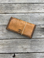 Rustic leather checkbook cover with hand stamped diamond border and maker’s mark