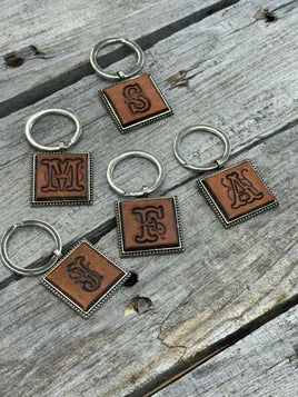Hand Stamped Leather Initial Keychains – Floral Script Font