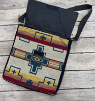 Southwest woven messenger bag with hand-painted leather Thunderbird patch, handmade by Cherokee Rose Custom Leather in East Texas.