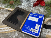 Hand-carved feather and floral leather memo pad holder in English Bridle brown with black accents, handmade by Cherokee Rose Custom Leather.