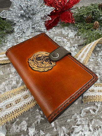 Hand-carved feather and floral leather memo pad holder in English Bridle brown with black accents, handmade by Cherokee Rose Custom Leather.