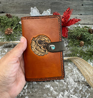 Hand-carved feather and floral leather memo pad holder in English Bridle brown with black accents, handmade by Cherokee Rose Custom Leather.