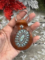 Oval Sleeping Beauty Stamped Turquoise Leather Key Fob