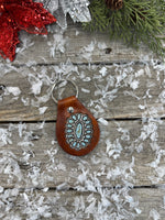 Oval Sleeping Beauty Stamped Turquoise Leather Key Fob