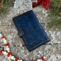 Hand stamped blue leather memo pad holder with bees, butterflies, and flowers, handmade by Cherokee Rose Custom Leather in East Texas.