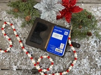 Hand stamped blue leather memo pad holder with bees, butterflies, and flowers, handmade by Cherokee Rose Custom Leather in East Texas.