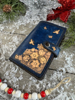 Hand stamped blue leather memo pad holder with bees, butterflies, and flowers, handmade by Cherokee Rose Custom Leather in East Texas.