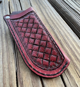 Handmade mahogany red leather knife sheath with hand-stamped basketweave design, vertical right-side carry, by Cherokee Rose Custom Leather.