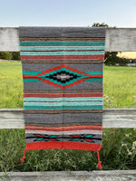 20" x 40" Orange and Gray Feather Saltillo Accent Rug