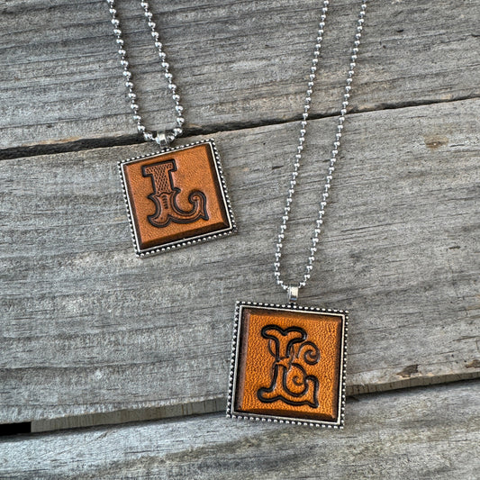 Handmade Letter L leather initial necklaces in Western Block and Floral Script fonts