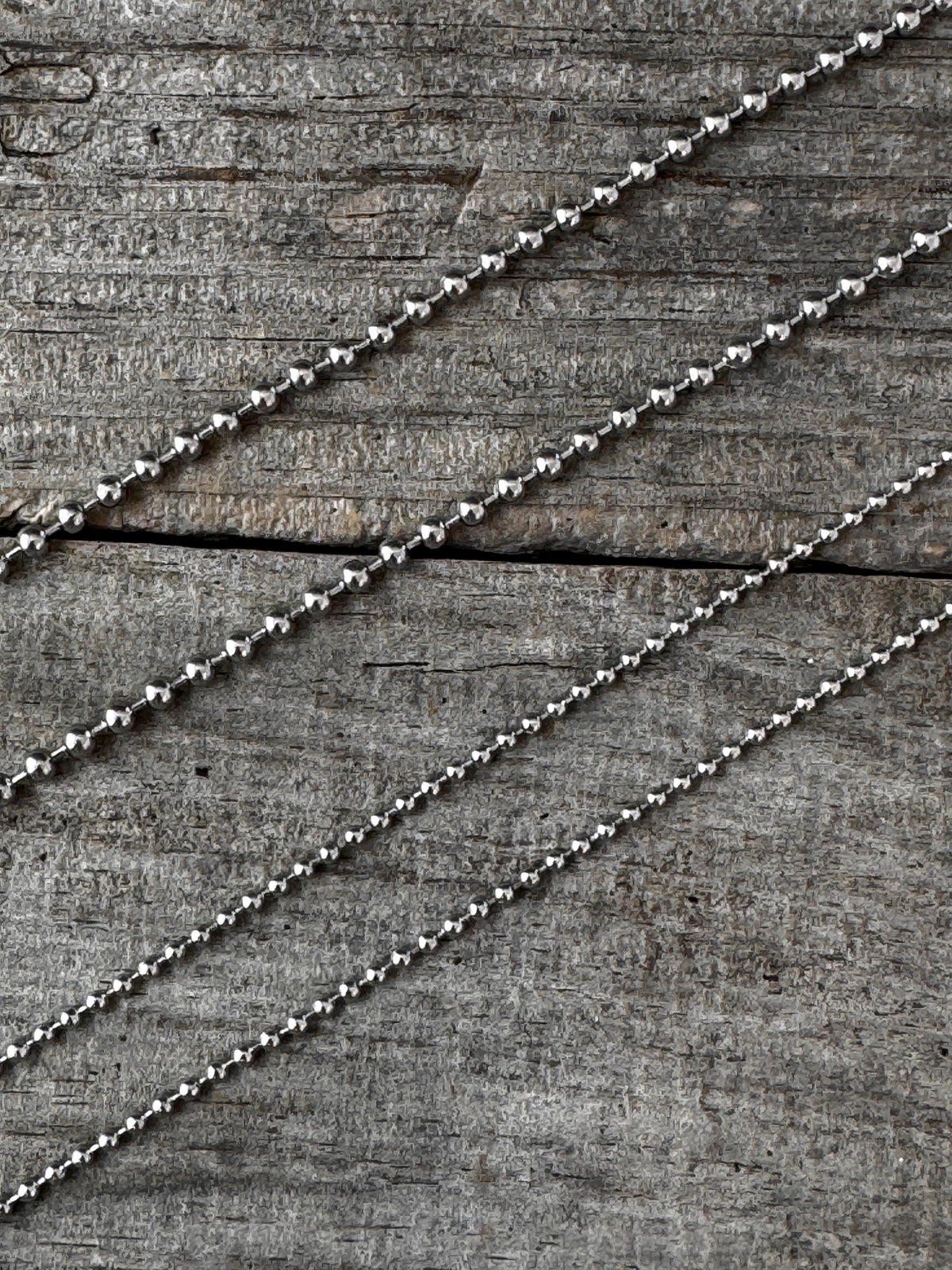 Side-by-side comparison of 2mm and 3mm stainless steel ball-chain thicknesses