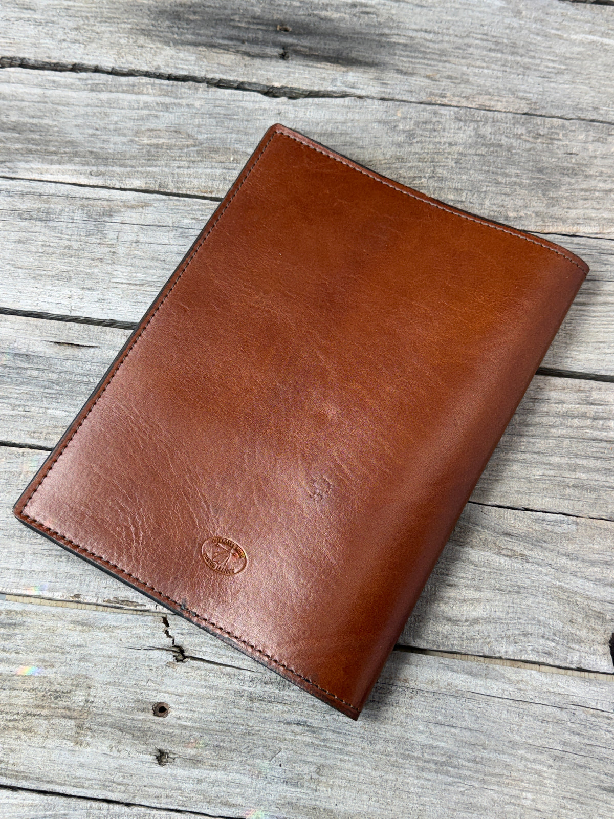 Smooth medium brown full grain leather composition notebook cover back view