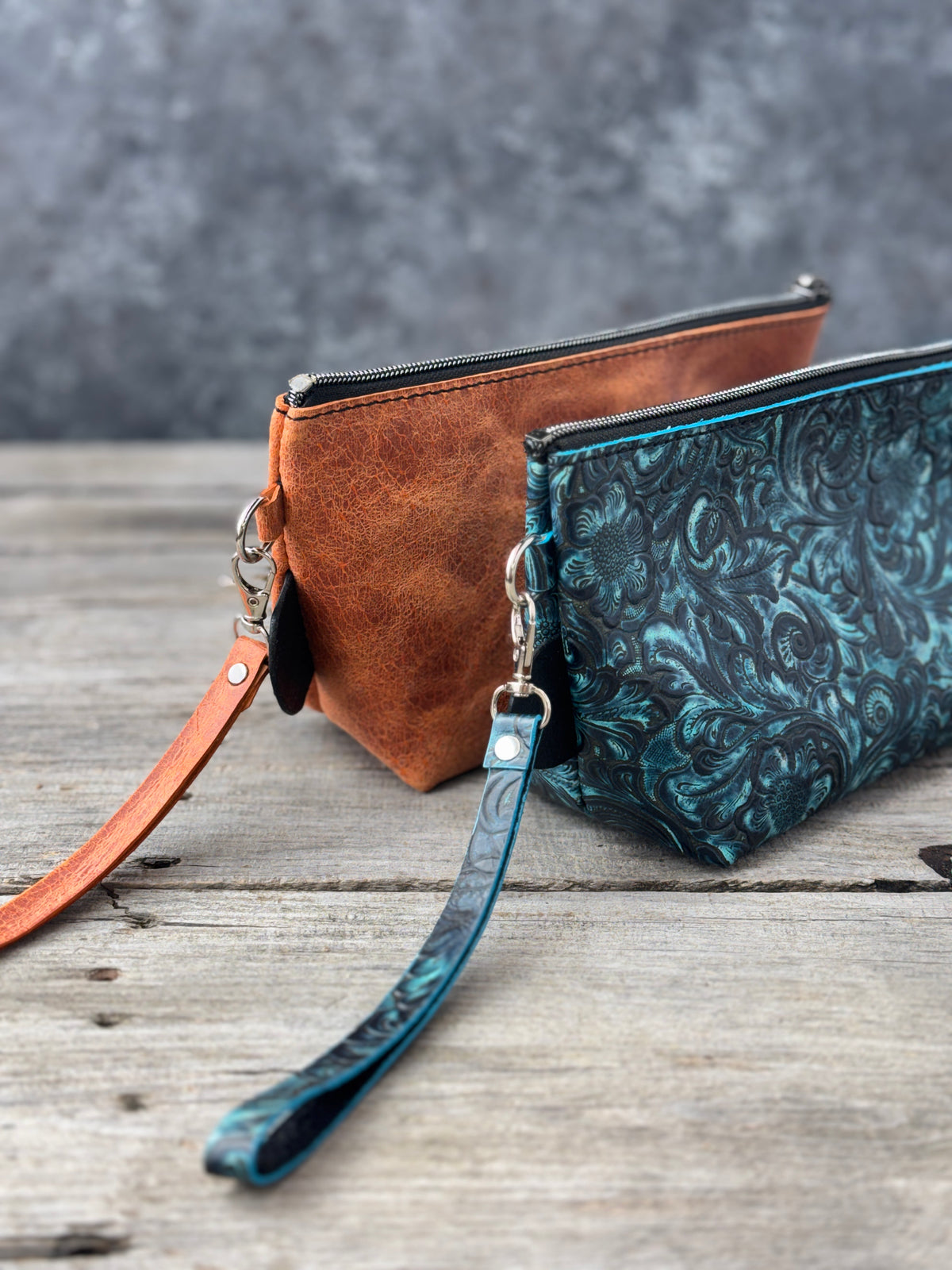 Handmade medium zippered leather makeup bags in two color choices