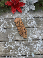 Hand tooled leather cast iron skillet handle cover with oak leaf and acorn carving, light tan dye, handmade by Cherokee Rose Custom Leather in East Texas.