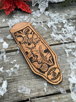 Hand tooled leather cast iron skillet handle cover with oak leaf and acorn carving, light tan dye, handmade by Cherokee Rose Custom Leather in East Texas.