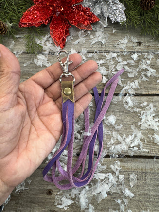 Hand cut purple suede pigskin fringe purse tassel with rustic brown leather top and nickel clip, handmade by Cherokee Rose Custom Leather.
