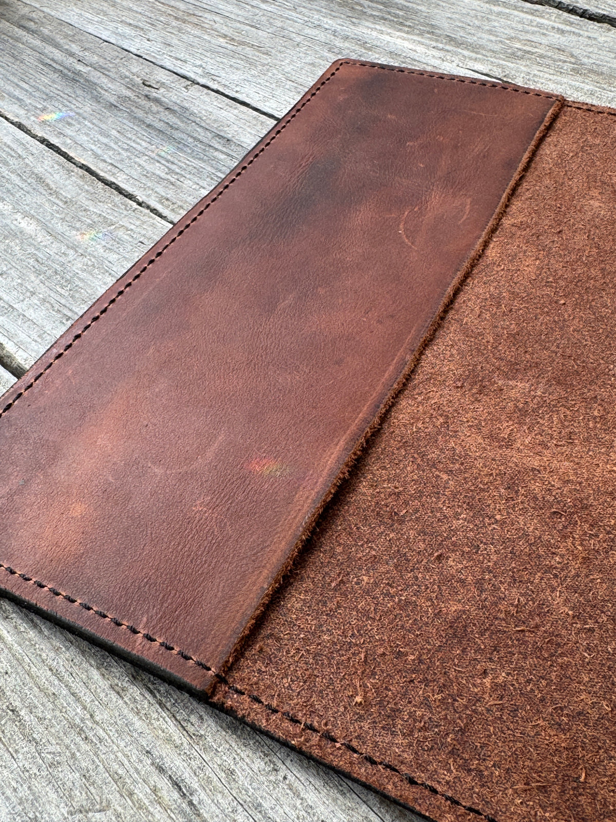 Redwood oil tanned leather composition notebook cover showing natural marbling and leather grain