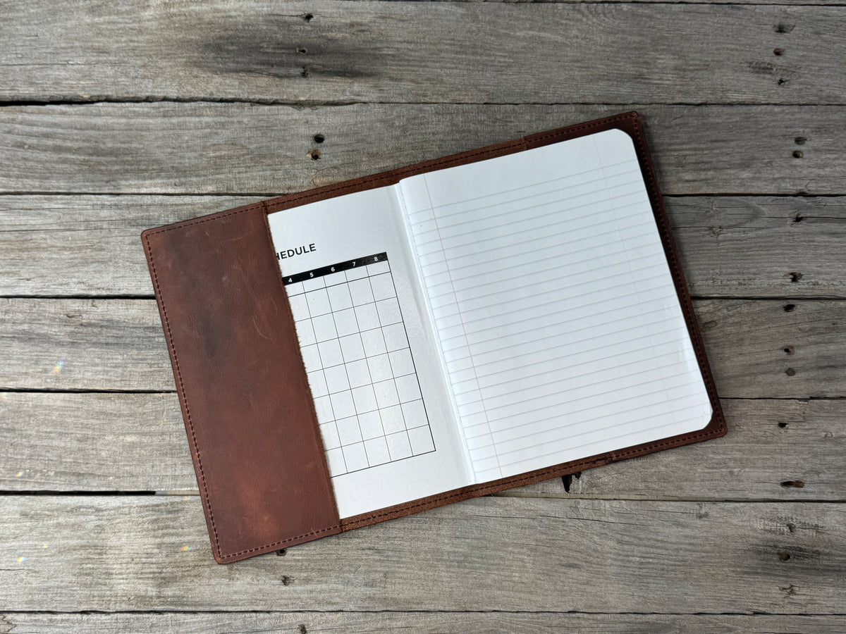 Redwood leather composition notebook cover open with refillable wide ruled notebook