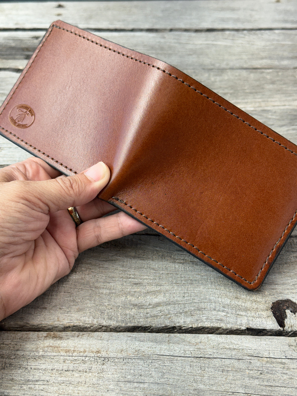 Rodeo Tan oil tanned leather bifold wallet open showing full grain leather exterior