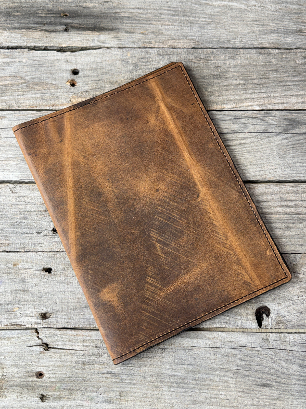 Rustic brown oil tanned leather composition notebook cover with natural range marks