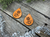 Hand-stamped leather earrings with honey bee and flower design, sterling silver ear wires, handmade by Cherokee Rose Custom Leather in East Texas.
