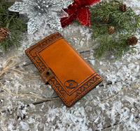 Stamped border Western leather memo pad holder with crocodile-embossed accents and black snap closure, handmade by Cherokee Rose Custom Leather.