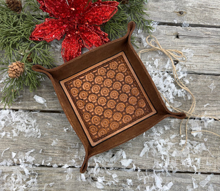 Hand-tooled leather valet tray with geometric circle stamped pattern, handmade by Cherokee Rose Custom Leather in East Texas