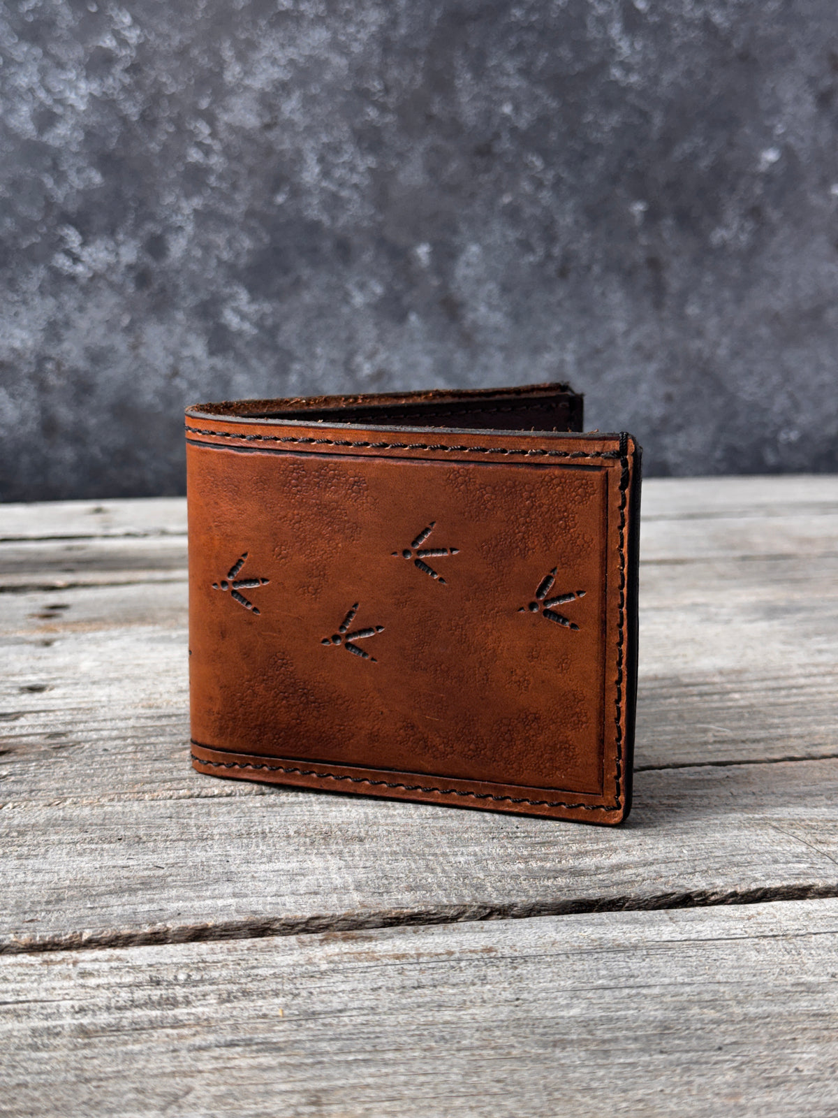 Turkey Track Stamped Leather Bifold Wallet