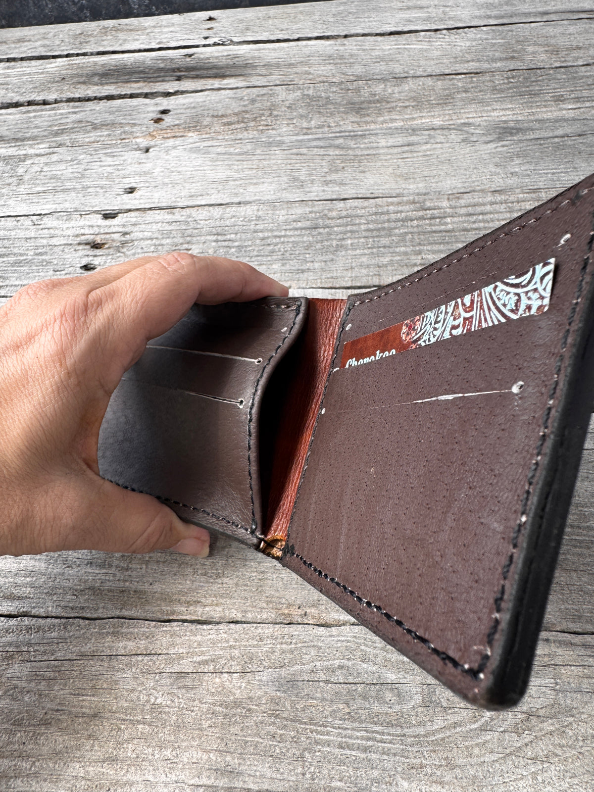 Turkey Track Stamped Leather Bifold Wallet