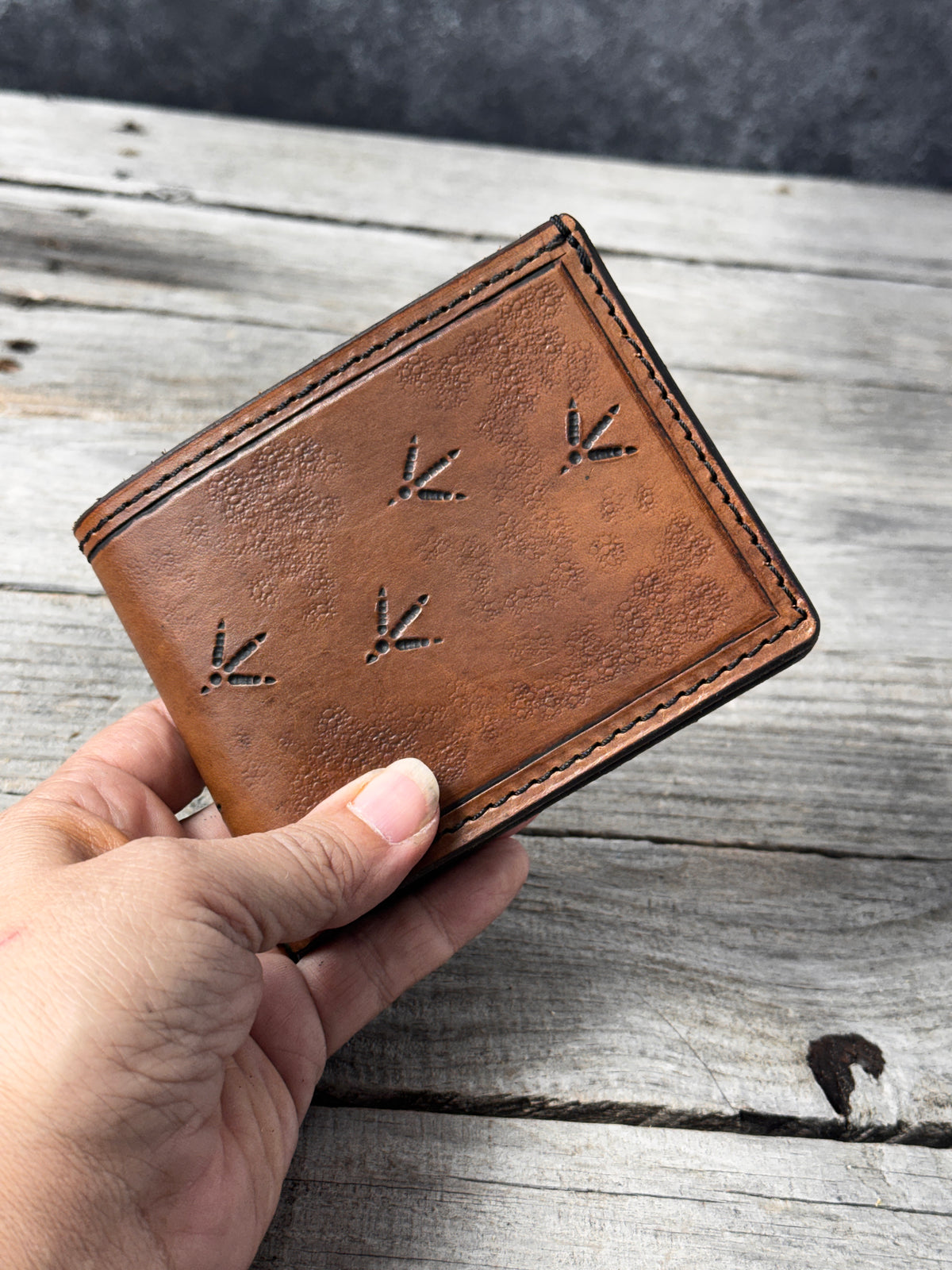Turkey Track Stamped Leather Bifold Wallet