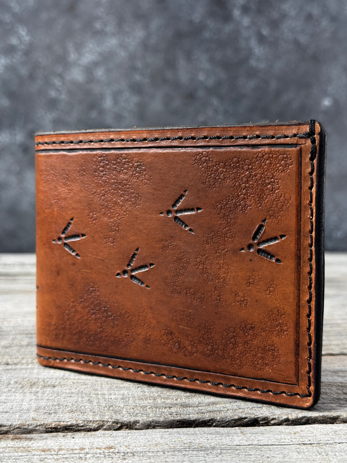 Turkey Track Stamped Leather Bifold Wallet