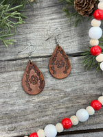 Medium brown teardrop leather earrings with Thunderbird and arrow stamped design, sterling silver ear wires, handmade by Cherokee Rose Custom Leather in East Texas.