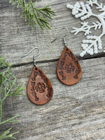 Medium brown teardrop leather earrings with Thunderbird and arrow stamped design, sterling silver ear wires, handmade by Cherokee Rose Custom Leather in East Texas.