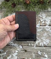 Two-tone handmade leather card wallet in reddish oil-tanned and black pigskin leather, stitched with brown waxed thread by Cherokee Rose Custom Leather.