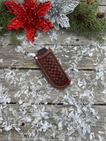 Handmade mahogany red leather knife sheath with hand-stamped basketweave design, vertical right-side carry, by Cherokee Rose Custom Leather.