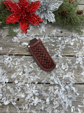 Handmade mahogany red leather knife sheath with hand-stamped basketweave design, vertical right-side carry, by Cherokee Rose Custom Leather.