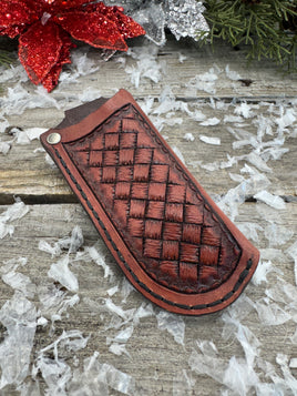 Handmade mahogany red leather knife sheath with hand-stamped basketweave design, vertical right-side carry, by Cherokee Rose Custom Leather.