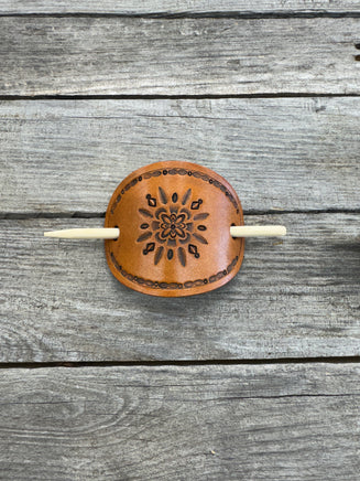 Hand stamped geometric feather leather hair barrette with bamboo hair stick.