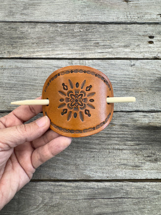 Hand stamped geometric feather leather hair barrette with bamboo hair stick.