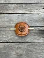 Hand stamped geometric feather leather hair barrette with bamboo hair stick.