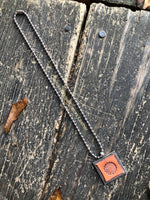 Daisy Stamped Leather Pendant Necklace